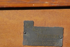 Stickley Brothers signature brass tag: "Quaint Furniture" "Stickley Bros. Co.,
Grand Rapids, Mich. Attached to back, faint stenciled catalogue number also on the back.  

